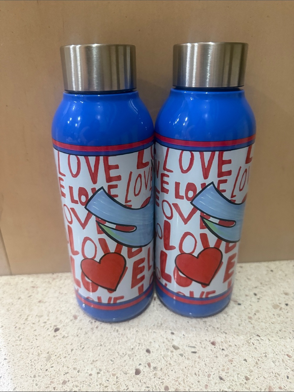 Brighton Collectibles stainless steel bottles.  Set of 2